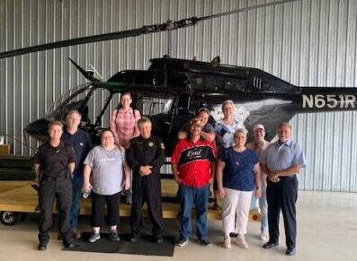 Group in front of RCSD helicopter